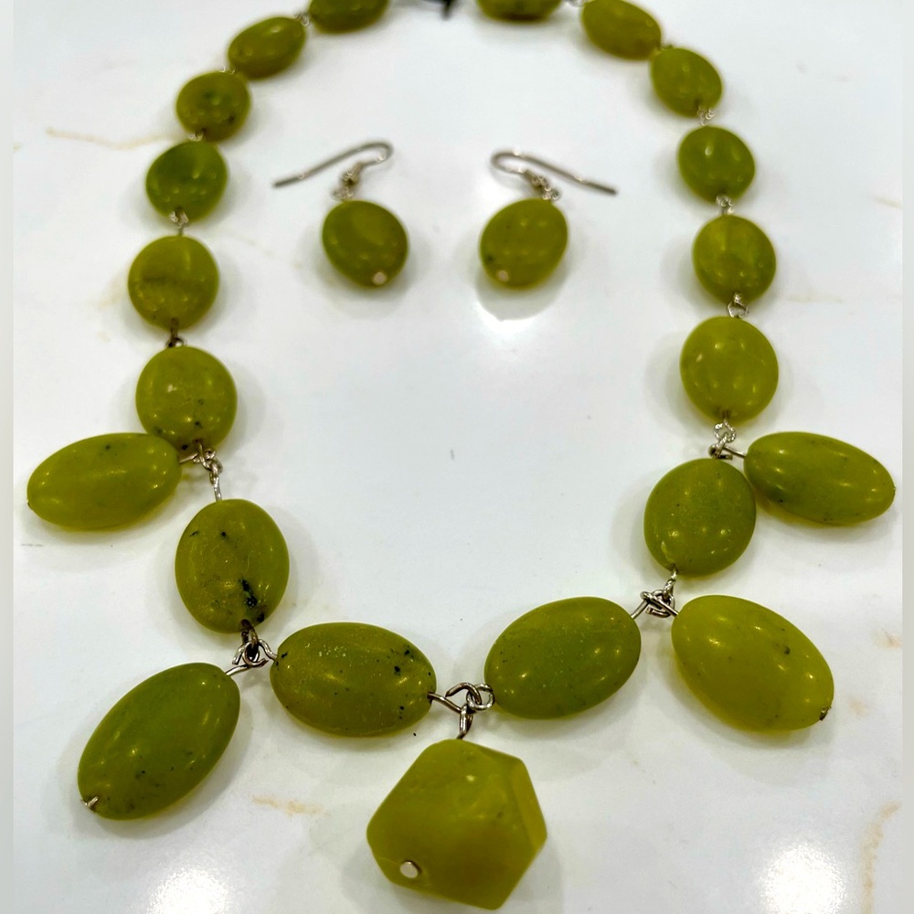 Vintage green stone necklace and matching earrings.